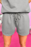 LC625933-P11-S, LC625933-P11-M, LC625933-P11-L, LC625933-P11-XL, LC625933-P11-2XL, Gray Textured Ruffle Split Top and Drawstring Shorts