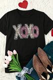 LC25219489-2-S, LC25219489-2-M, LC25219489-2-L, LC25219489-2-XL, LC25219489-2-2XL, Black XOXO Leopard Print T Shirt Valentines Day Heart Tops