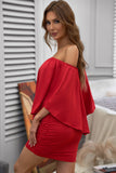 Robe Mini Poncho Noire Superposée à Plusieurs Pansements