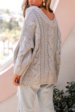 Pull épais en tricot torsadé à manches lanterne et col en V